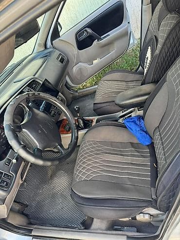 Nissan Primera: 2001 г., 2 л, Механика, Газ, Универсал — 9