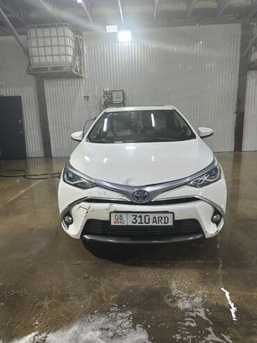 машина виндом: Toyota Corolla: 2018 г., 1.8 л, Автомат, Гибрид, Седан — 10