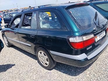 катушка мазда 323: Mazda 626: 1999 г., 1.8 л, Механика, Бензин, Универсал — 3