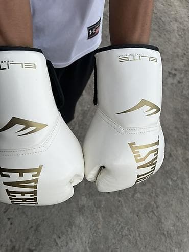 перчатки ufc: Боксерские перчатки Everlast Elite, белые с золотым логотипом. - — 3