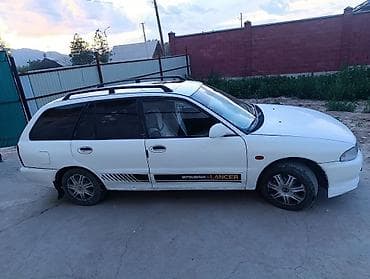 прием акум: Mitsubishi Lancer: 1995 г., 1.6 л, Автомат, Бензин, Универсал — 9