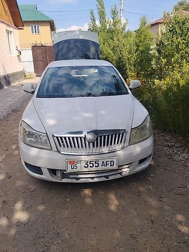 Skoda Octavia: 2013 г., 1.6 л, Механика, Бензин, Седан