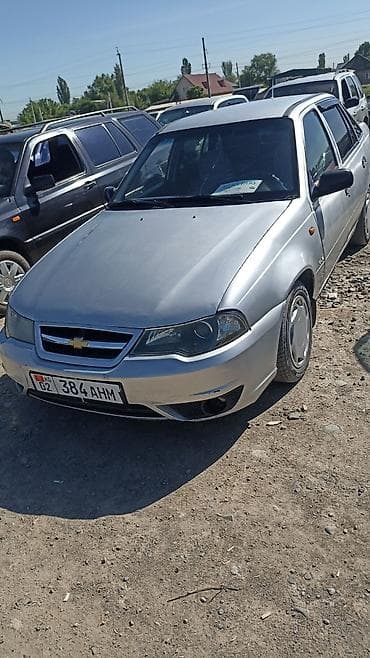 kia sephia: Chevrolet Nexia: 2009 г., 1.5 л, Механика, Седан — 4