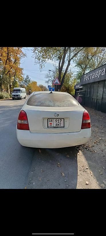 задний стоп примера: Nissan Primera: 2001 г., 2 л, Вариатор, Бензин, Хэтчбэк — 2