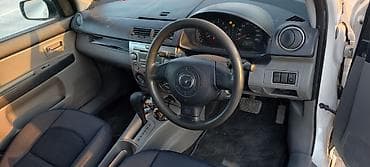 с последуюшим выкупом: Mazda Demio: 2003 г., Бензин — 8
