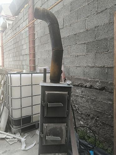 Металлическая твердотопливная печь-отопитель с дымоходом и датчиком — 2