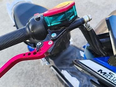 перья: Скутер Pantera. - Яркая передняя оптика: две основные фары — 10