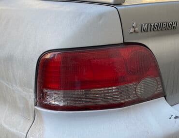 старая модель dell: Задний левый стоп-сигнал Mitsubishi 2001 г., Б/у, Оригинал, Япония — 1