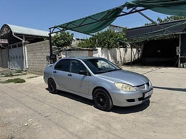 митсубиси оутлендер: Mitsubishi Lancer: 2003 г., 1.3 л, Механика, Бензин, Седан — 2