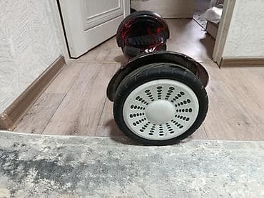 моноколесо сколько стоит: Гироскутер 10.5" с ручкой для переноски, расцветка «черный с красными — 1