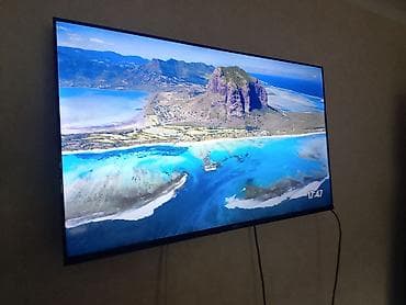 smart tv: Телевизор yasin с тонкими рамками, диагональ около 55–65". Настенное — 1