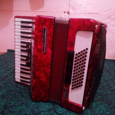 купить бу аккордеон: Аккордеон Weltmeister (Германия), красный перламутровый корпус — 2