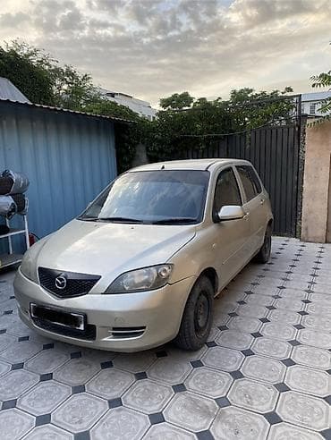 простой: Mazda Demio: 2003 г., 1.5 л, Автомат, Бензин, Хэтчбэк — 2