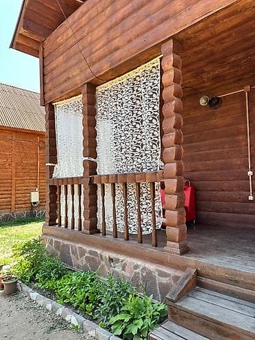 элитный особняк: Уютный деревянный домик из бруса с террасой и полноценной зоной для — 1