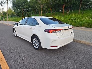 byd e5: Toyota Corolla: 2023 г., 1.8 л, Вариатор, Гибрид, Седан — 8