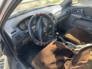 ravon 3: Mazda 323: 2003 г., 1.6 л, Механика, Бензин, Седан — 7