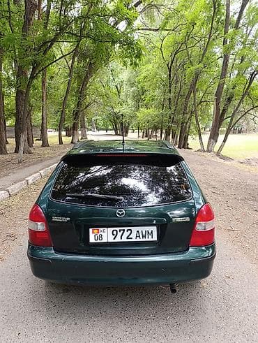 e2 byd: Mazda 323: 2000 г., 1.5 л, Механика, Бензин, Универсал — 5