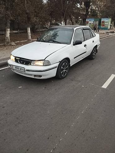 автомобиль daewoo nubira: Daewoo Nexia: 1996 г., Бензин, Седан — 4