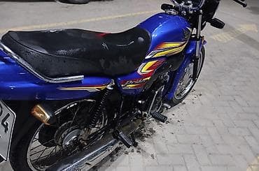 Мотоциклы: Honda Pridor — легкий городской мотоцикл синего цвета. Основные — 3