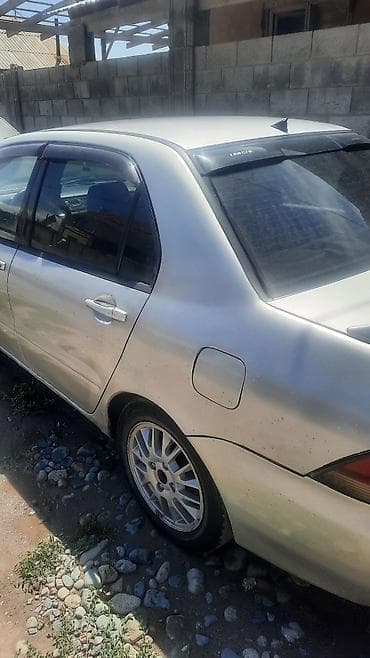 Унаа сатуу: Mitsubishi Lancer: 2001 г., 1.6 л, Кол менен иштөөчү, Седан — 7