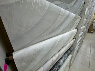 цена обоев за рулон: Рулоны обоев с абстрактным рисунком в пастельных тонах. Преобладают — 1