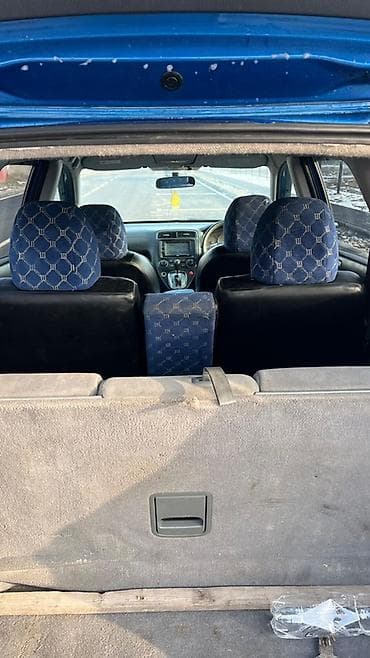 степвагон 2005: Просторный синий минивэн/универсал с пятидверным кузовом. Практичный — 4