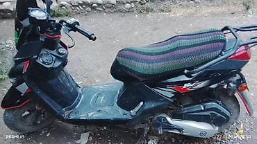 gsx suzuki: Скутер 50–125 см³ (визуально класс 50сс) в городском/кросс-стайле — 1