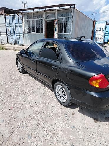 e 303: Kia Spectra: 2007 г., 1.6 л, Седан — 1