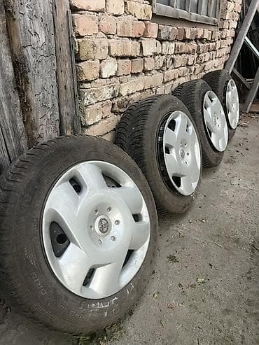 батарея скутер: Комплект из 4 колес в сборе: шины + штампованные диски с серебристыми — 1