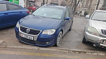 Volkswagen Touran: 2007 г., 1.4 л, Автомат, Минивэн — 1