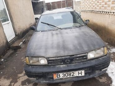 Продажа авто: Nissan : 1996 г., Механика — 7