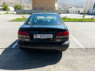 7 00 r16: Mazda 626: 1997 г., 1.8 л, Механика, Бензин, Седан — 6