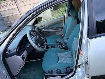 wuling mini ev: Nissan Almera: 2002 г., 1.8 л, Механика, Бензин, Хэтчбэк — 10
