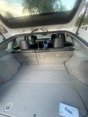 byd e2 2022: Toyota Prius: 2011 г., 1.8 л, Гибрид, Хэтчбэк — 4