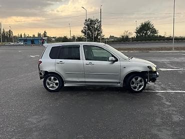 Mazda Demio: 2002 г., 1.5 л, Типтроник, Бензин, Хэтчбэк — 2