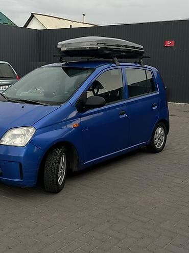 алмашаи: Daihatsu Cuore: 2004 г., 1 л, Механика, Бензин, Хэтчбэк — 2