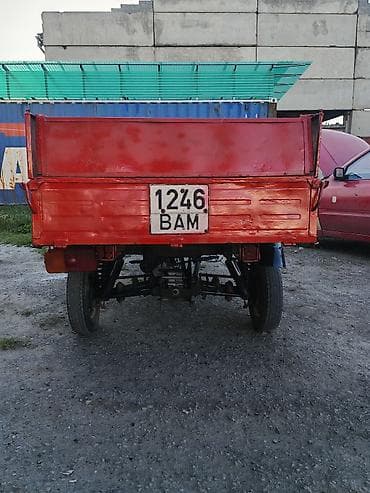 трёх калёсный скутер: Грузовой мотороллер-трицикл с кузовом Описание: - Компоновка — 5