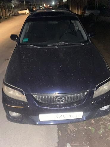 honda stream: Mazda Familia: 2003 г., Универсал — 1