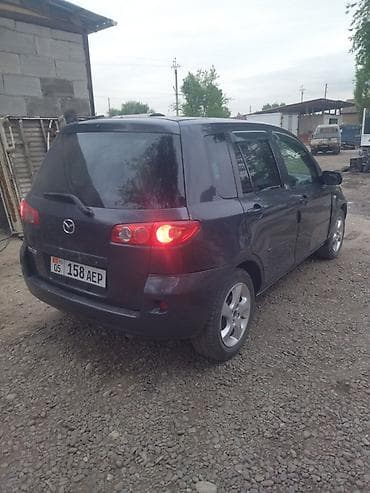 машн: Mazda Demio: 2005 г., Хэтчбэк — 2