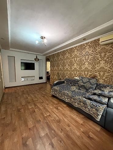 3 комнаты, 57 м², 1 этаж — 2