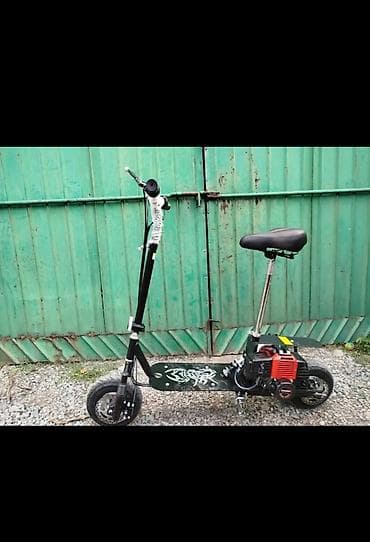 мотор мопеда: Бензиновый самокат с сиденьем - Двигатель: одноцилиндровый — 2