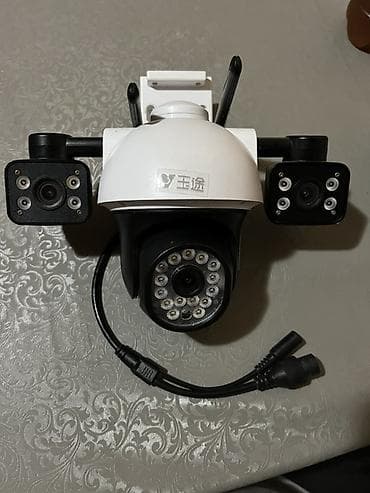 Уличная поворотная Wi‑Fi IP‑камера видеонаблюдения с дополнительными