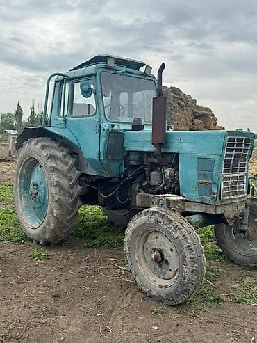 Трактор колесный, класс тяги ориентировочно 1,4–2,0 (тип МТЗ/ЮМЗ)