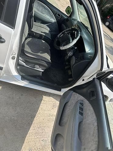 кондидер: Toyota Raum: 2000 г., 1.5 л, Автомат, Бензин, Минивэн — 7