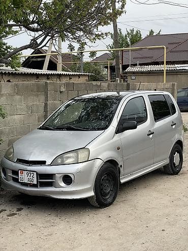 mazda 121: Daihatsu YRV: 2002 г. — 4