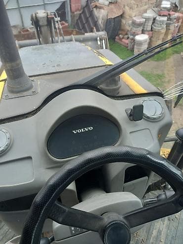 купить колёсный экскаватор бу: Экскаватор, Volvo, Колесный — 3