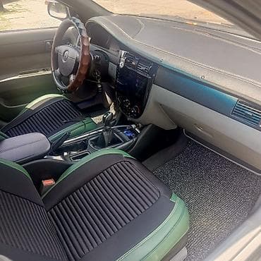 спарк капот: Daewoo Gentra: 2013 г., 1.5 л, Механика, Газ, Седан — 8