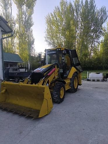 joon deer: Погрузчик, Caterpillar, 2008 г., Колесный, Ковшовый — 4