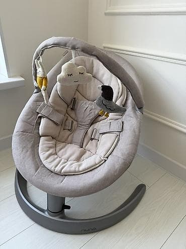 сандык жаван: Кресло-качалка для малышей Nuna Leaf (серый/бежевый) - Комфортная — 1