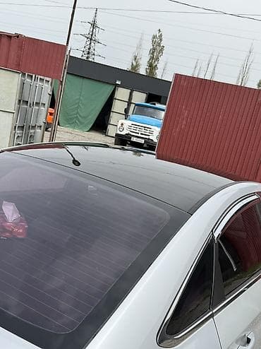 Тюнинг: Винил-оклейка крыши автомобиля в черный глянец Профессиональная — 2